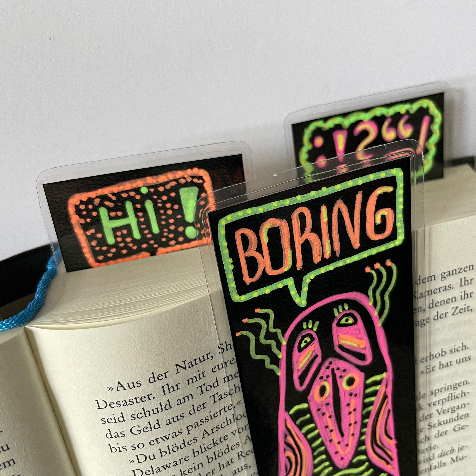 bookmarks birds neon close up