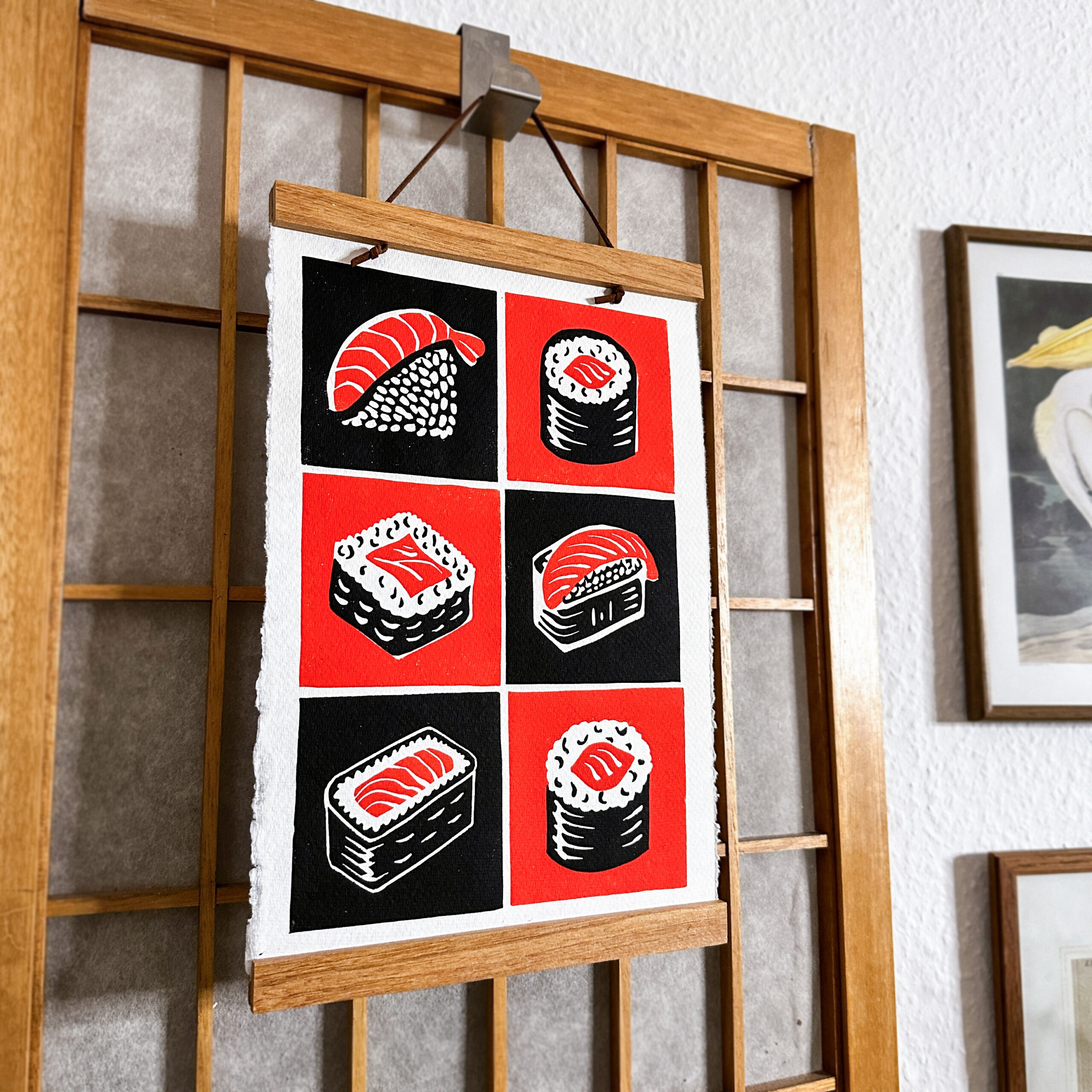 sushi lino print hanging