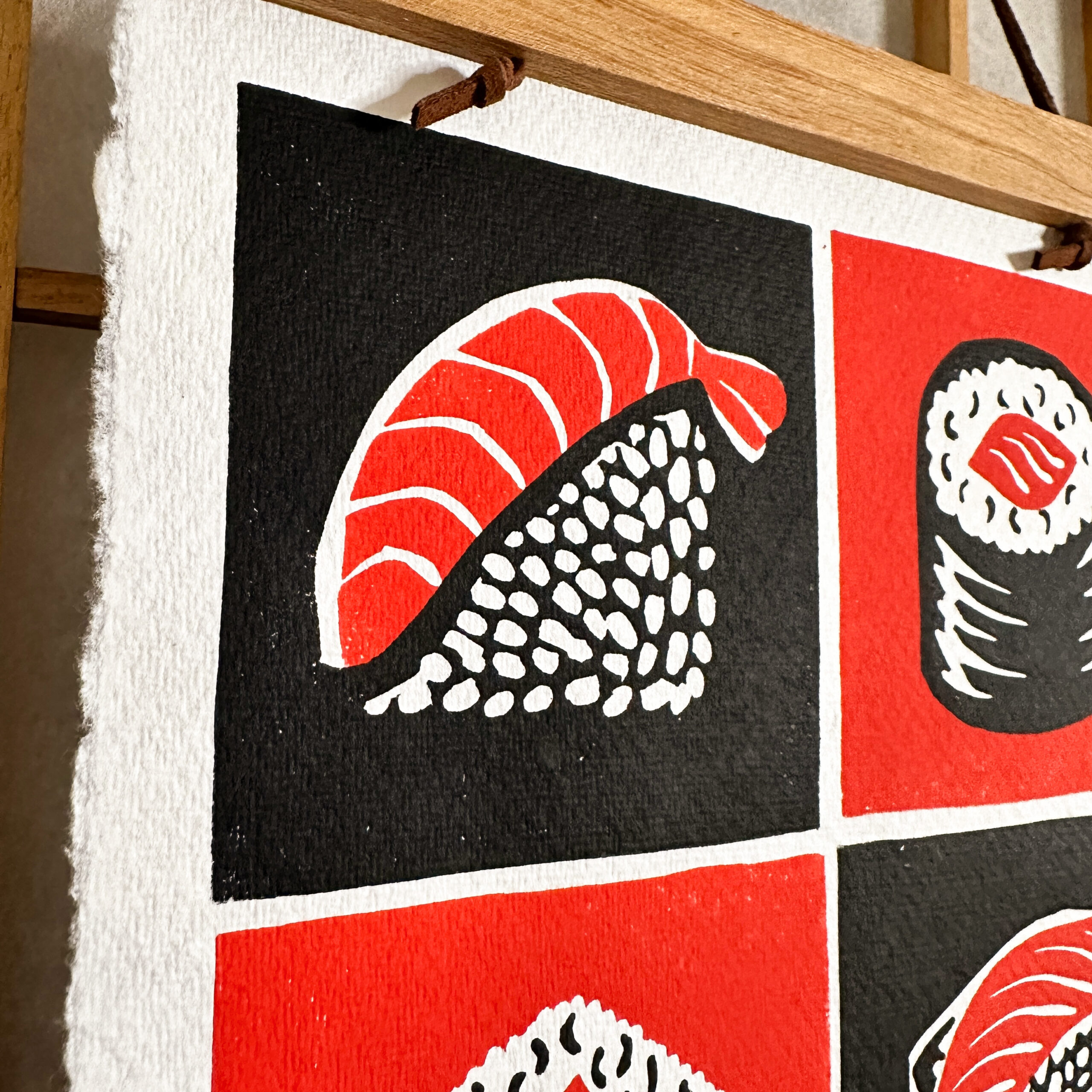 sushi lino print black and red detail nigiri