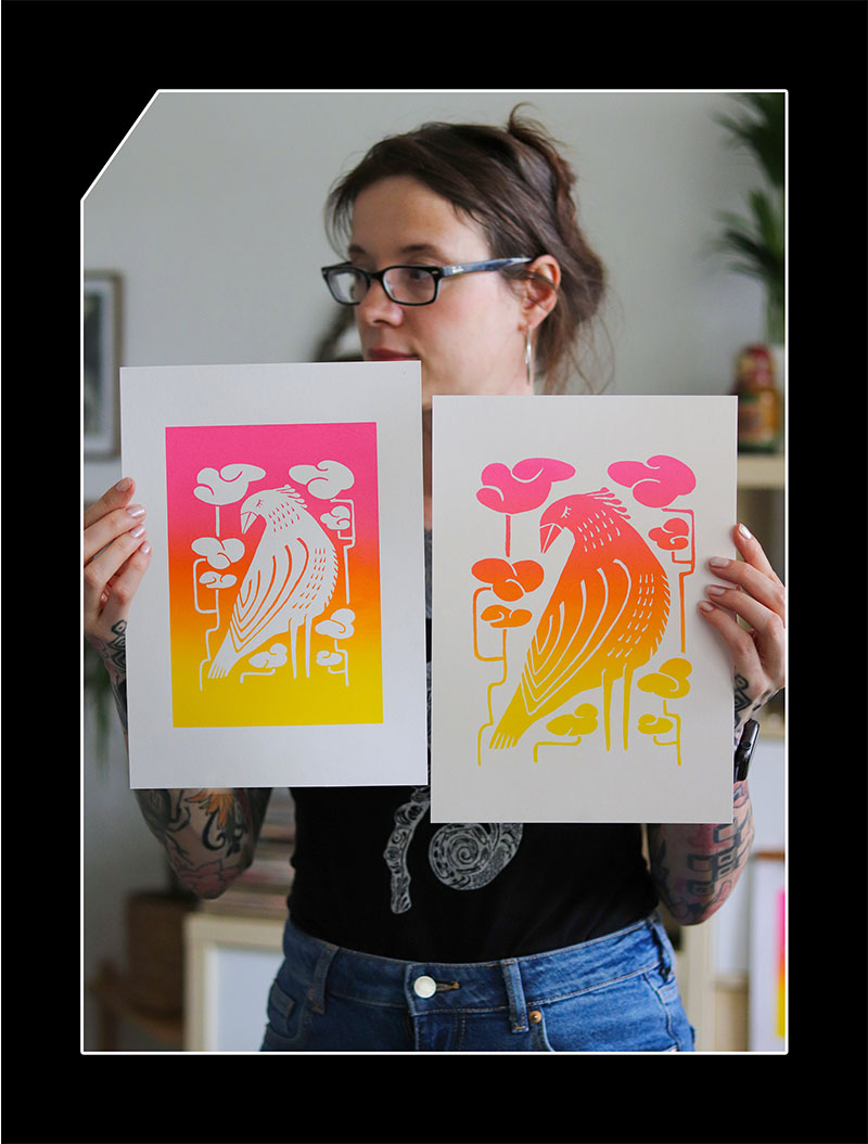 i am holding both gradient bird prints